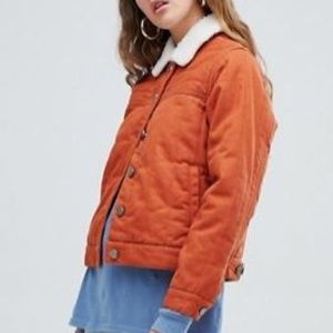 ASOS DESIGN cropped denim wadded jacket in rust